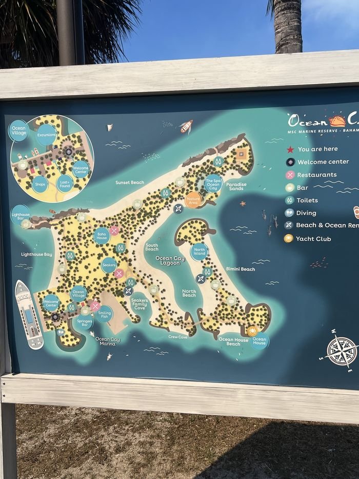 Ocean Cay's island map sign showing the ship at the welcome center, the beaches, bars, restaurants, the lagoon and Ocean House at the far end.